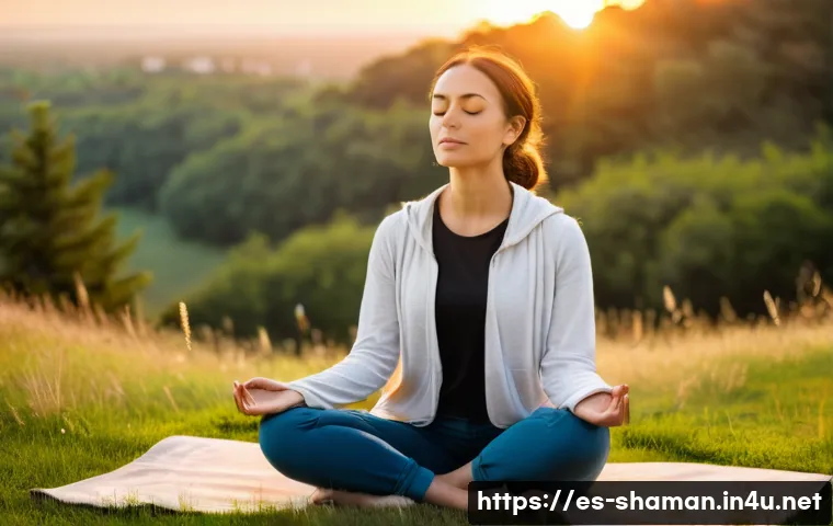 무속 신 내림 증상 - A serene young adult woman sitting cross-legged on a grassy hill at sunset, eyes closed in meditatio...